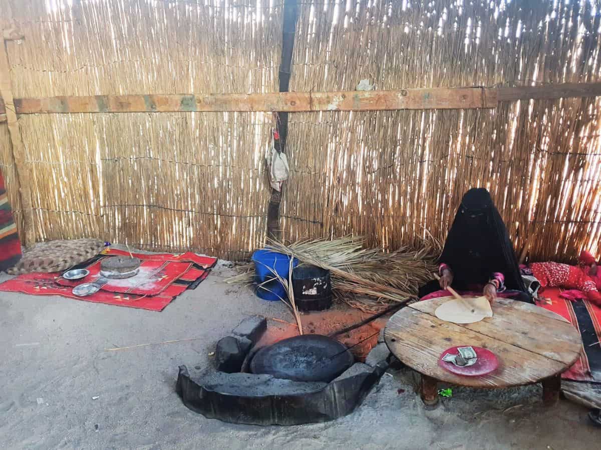local lady preparing bread in a traditional Egyptian village, Hurghada