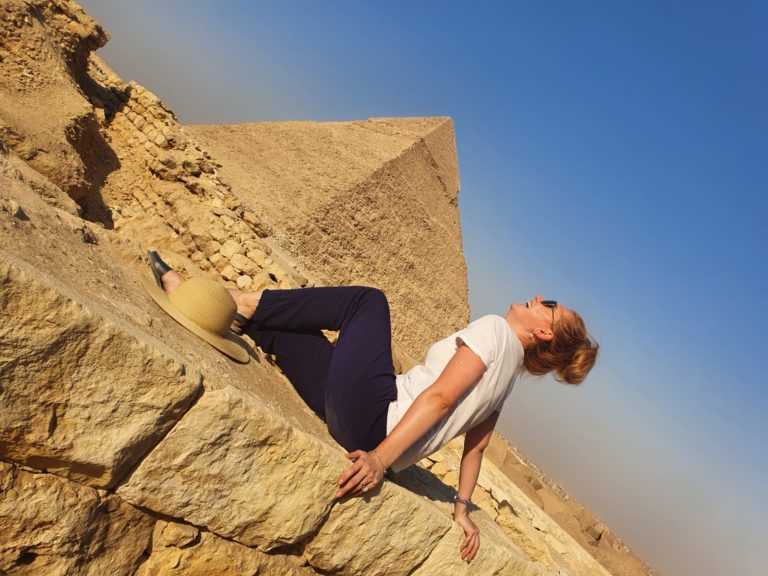 Taking picture in front of Giza Pyramid in Egypt in October
