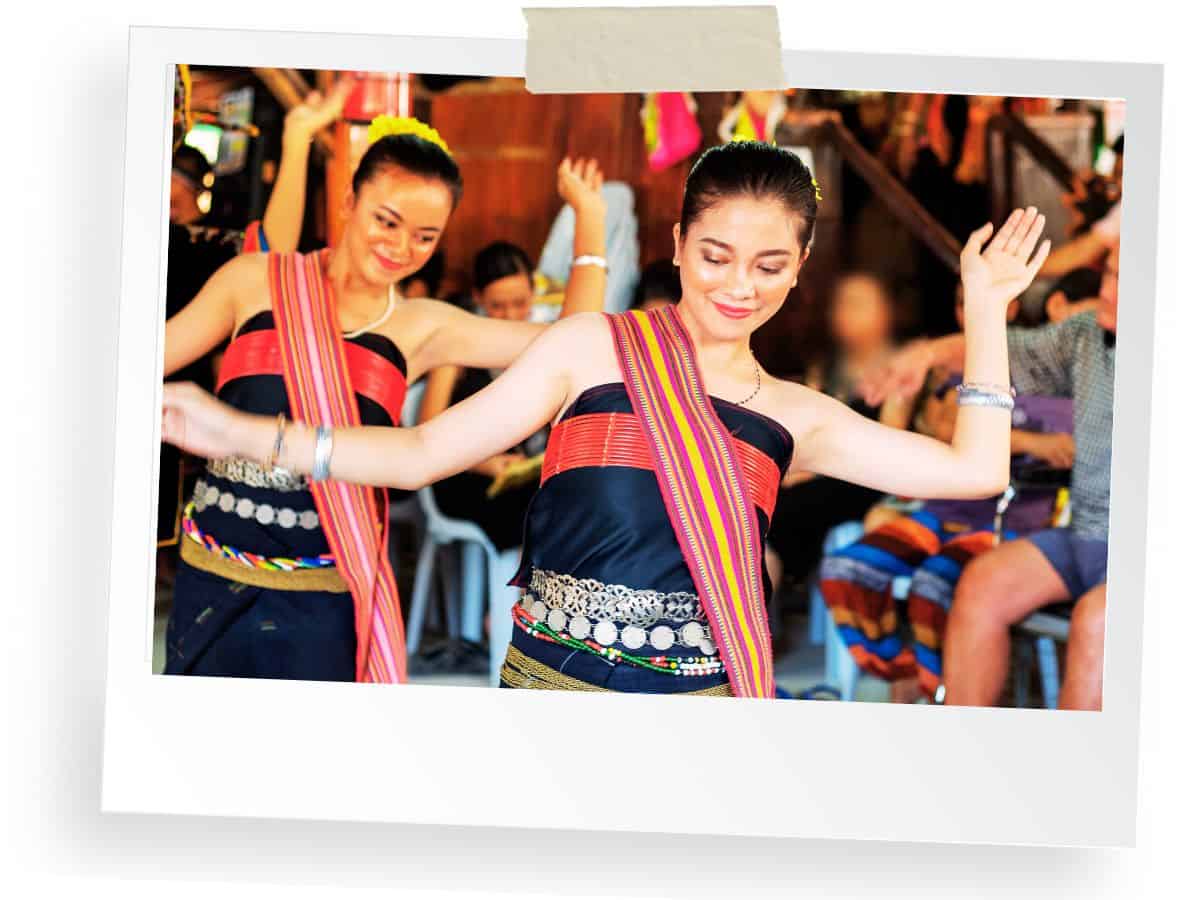 Local women in Borneo in a traditional dance, Malaysia