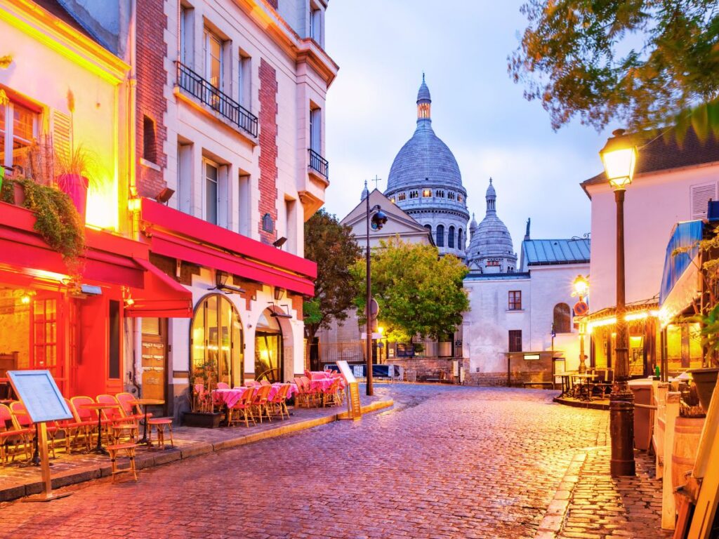 beautiful street with café terrace and great view of Paris, France