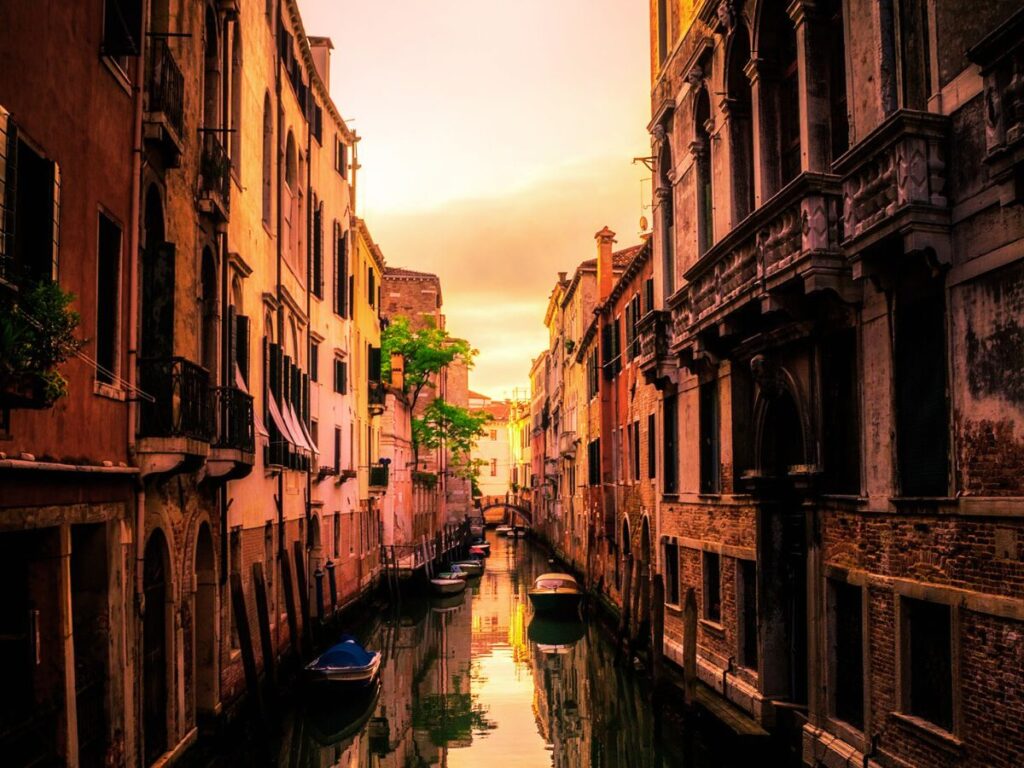 gondola with sunset on Venice canal Italy
