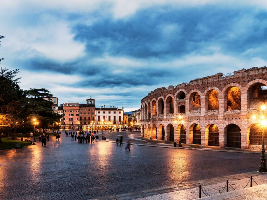 walking on the historical center piazza by night in Verona, Italy