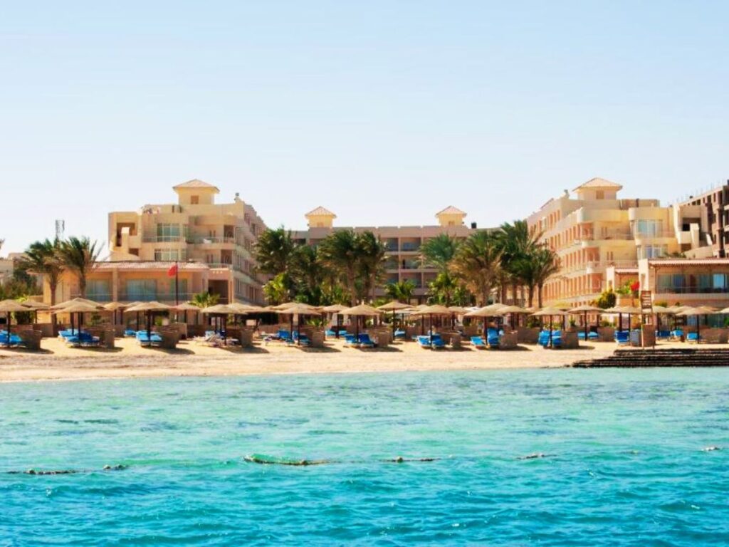 Beach and hotel, view from the see Sea Star Beau Rivage Hotel