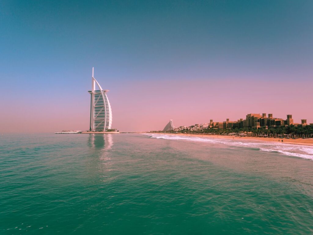 single women walking on the beach near Burj al Arab Dubai