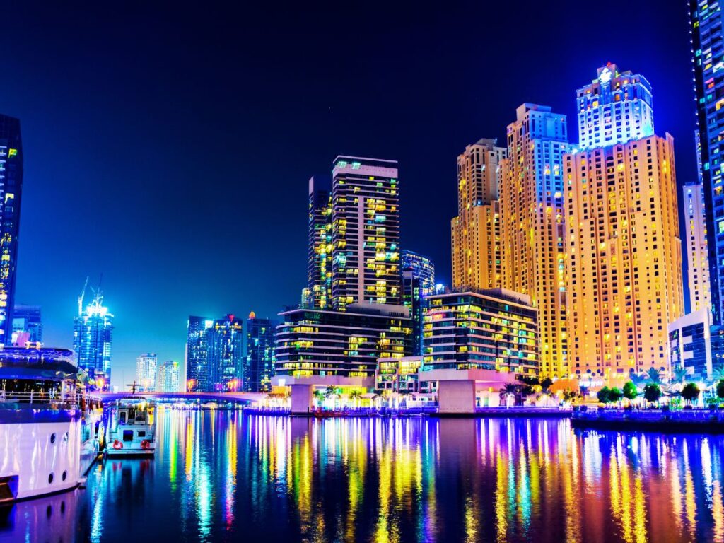 single women walking in Dubai Marina Side-Walk at night